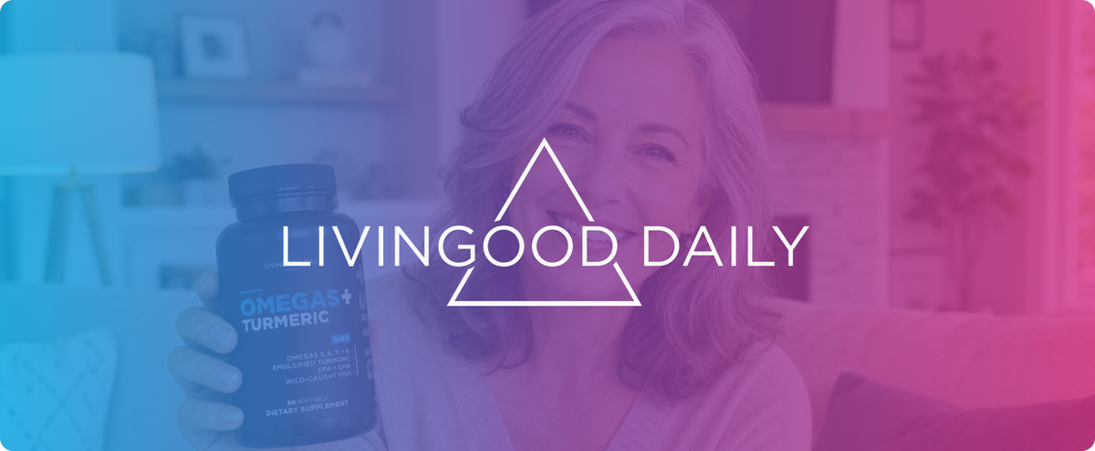 Woman holding Livingood Daily Omegas + Turmeric